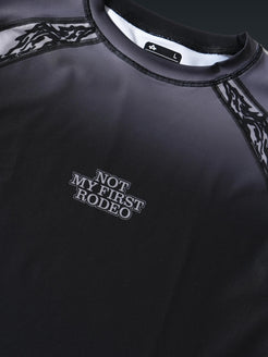 Not My First Rodeo After Dark rashguard, chest detail