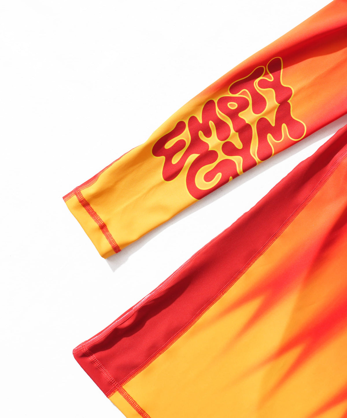 Sleeve detail — EMPTY GYM in groovy red-on-yellow poster type.