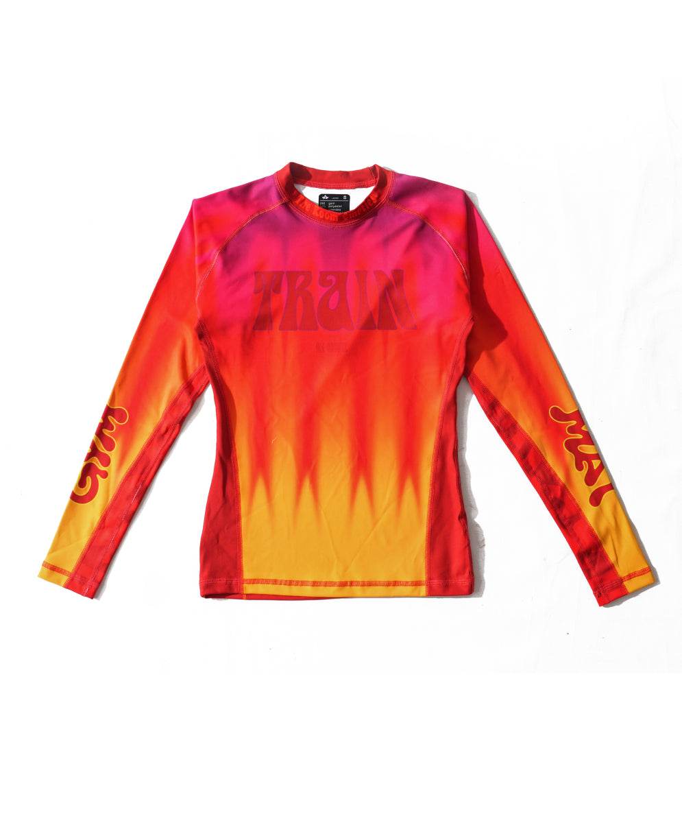 While They Tan rashguard shown flat, front view.